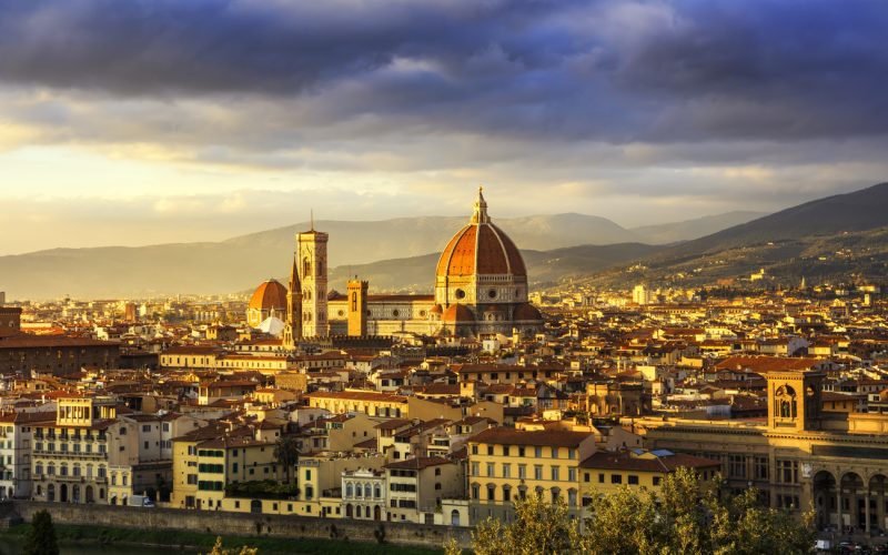 Florence or Firenze, Duomo Cathedral, Basilica Santa Maria del Fiore landmark and Giotto Campanile Sunset view from Michelangelo park square. Italy, Europe.